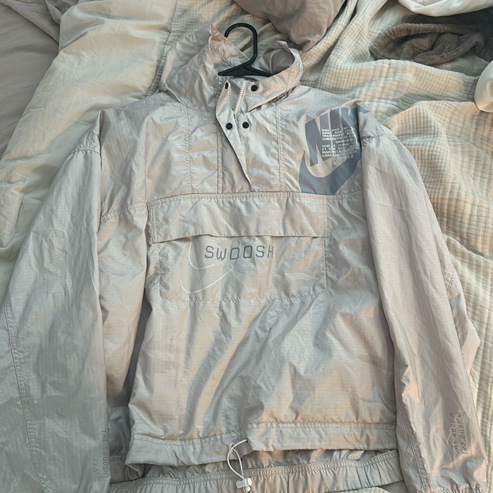 Nike cream colored half zip windbreaker